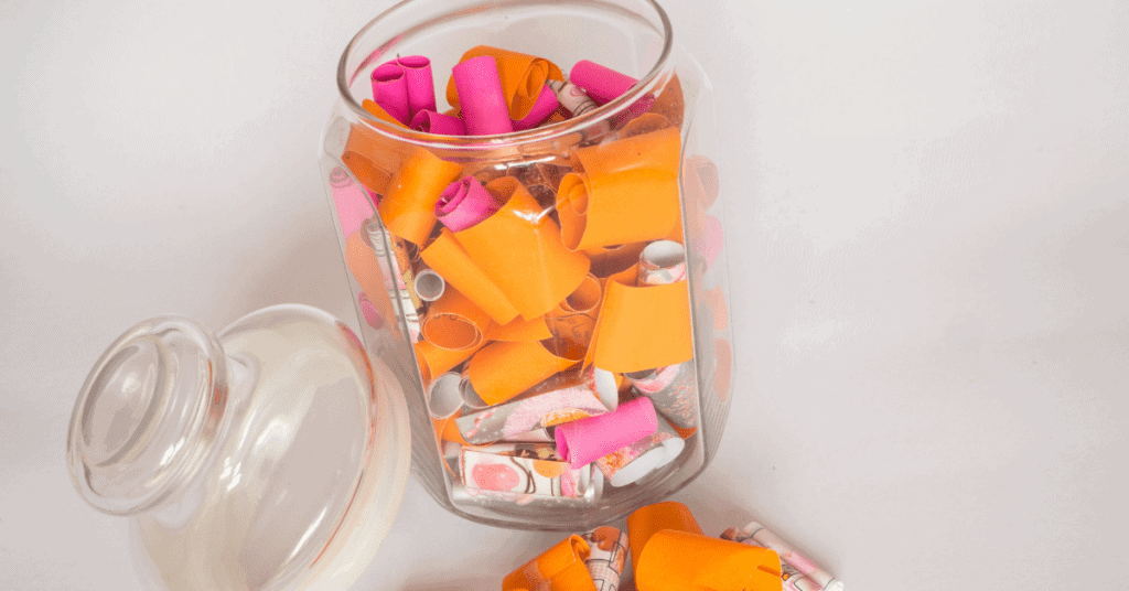 new year's resolutions idea: Making a family activity jar! (Jar filled with colourful curled up pieces of paper)