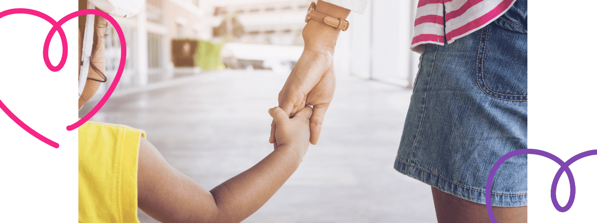 mum and toddler holding hands