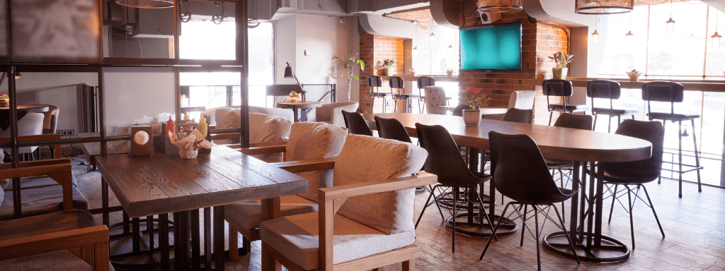 Things to do in Birmingham: baby-friendly cafes. Image shows a cafe space, with a variety of chairs and tables 