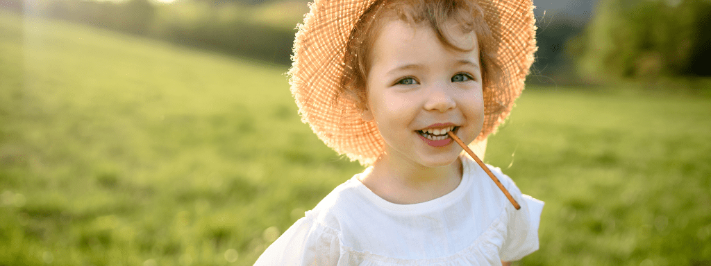 Things to do in Leeds: toddler is excitably running through a park.