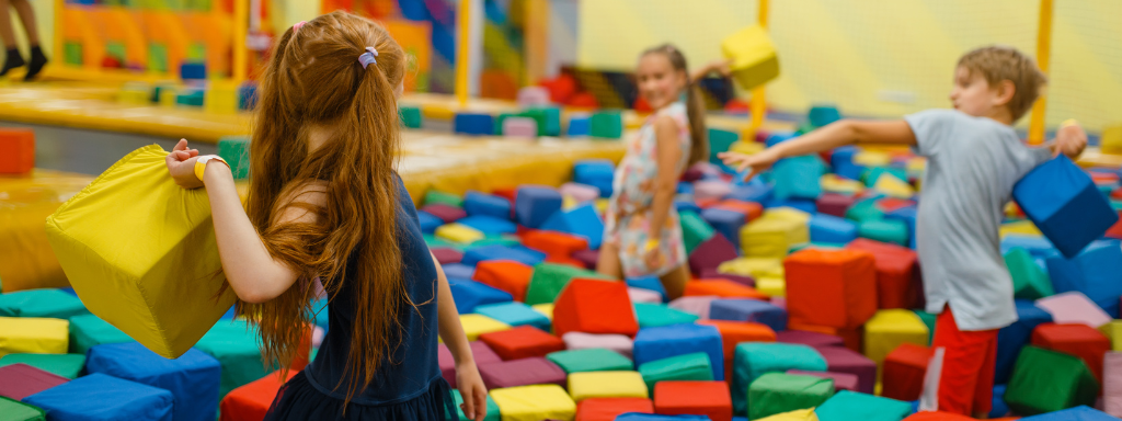 Things to do for families in Cardiff: image shows a group of kids playing in a soft play area