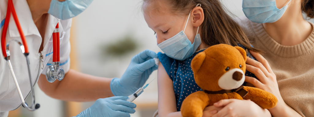 Toddler's Jab - young girl receives her jab