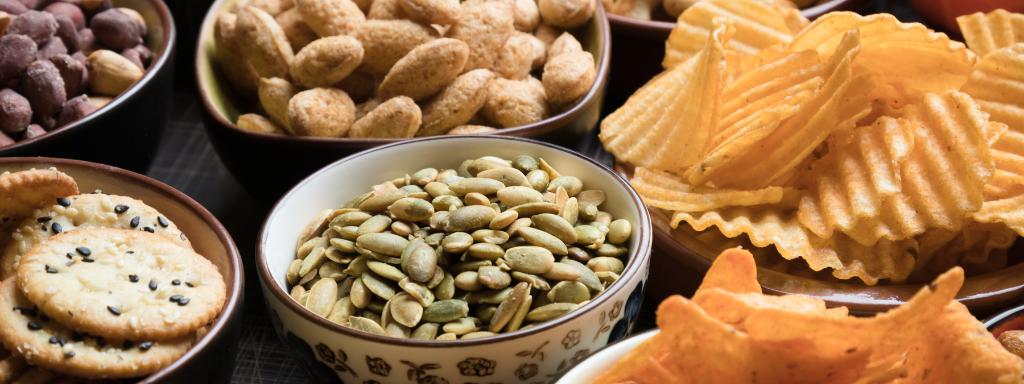 image shows a variety of foods that are high in salt.