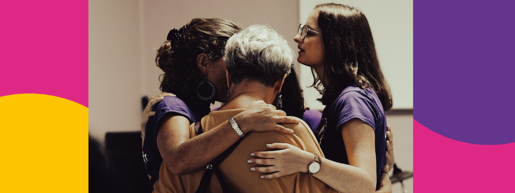 getting out again after a traumatic birth: A group of women hug